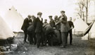 View: MR02909 Group of men from the Pals Battalions, including one with a violin, at leisure amongst tents in Heaton Park