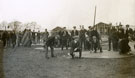 View: MR02910 Group of men from the Pals Battalions erecting tents in Heaton Park