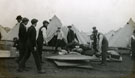 View: MR02922 Group of men from the Pals Battalions amongst tents with kit bags in Heaton Park