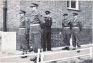 View: MR03422 Officers watching a parade