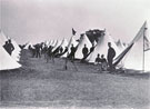 View: MR03496 Bell Tents and stacked rifles