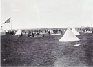 View: MR03497 Packing away tents