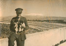 View: MR04105 Lieutenant Robert 'Rex' King-Clark and two puppies