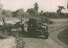 View: MR04279 Towing a captured Japanese Anti-Tank Gun