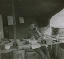 View: MR04328 Robert 'Rex' King-Clark at his desk