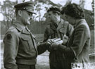 View: MR04387 Major Roy Baker receives a trophy